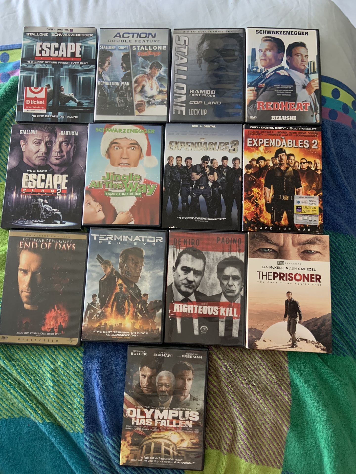 Movies. Unplayed Action Popular Dvds Stallone Schwarzenegger Ect. $2 Each