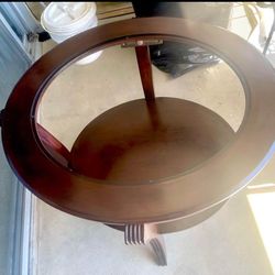 REDUCED $570  Coffee Oval mahogany or end table with glass top