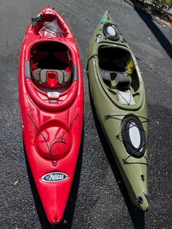 Two Sit-In Kayaks – Pelican Red and Olive Green