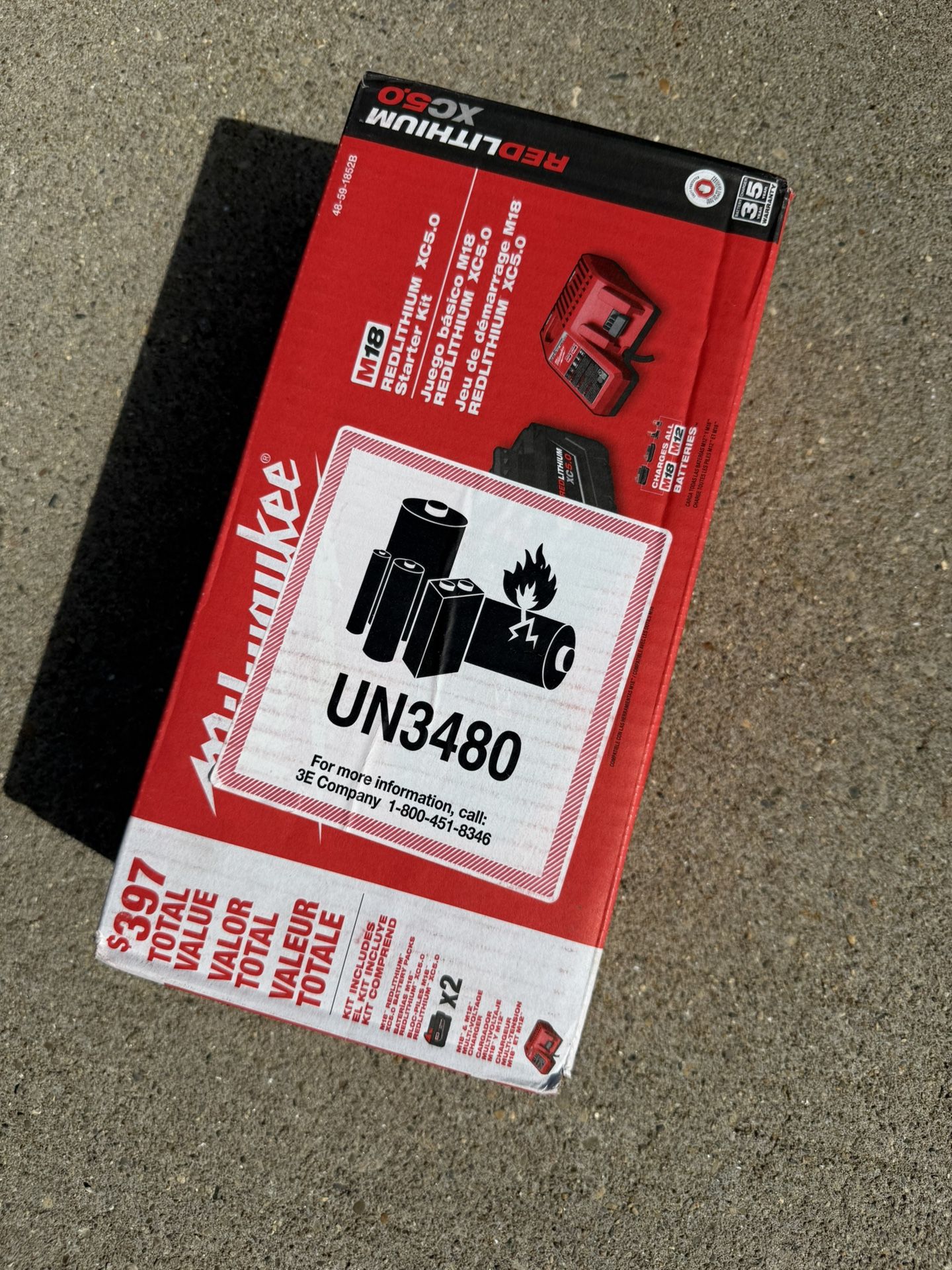 Milwaukee Charger And 2 Batteries