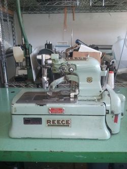 Reece buttonhole machine. Industrial sewing machine.
