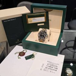 2015 Rolex GMT Master II 40mm 116713LN Black Dial 18k yellow gold and stainless steel oyster bracelet Full Set Box Card Tags