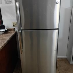 GE, STAINLESS  STEEL  REFRIGERATOR.  28"wide    29"deep    64"tall
