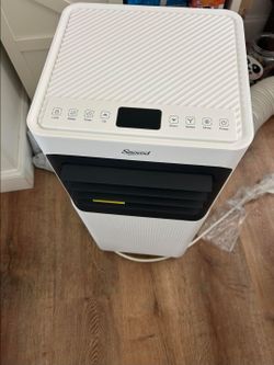 Brand new portable air conditioner 12k btu full window kit and drain hose