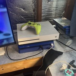 White Xbox One S 1 TB with 1 controller.