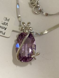 10ct oval cut Amethyst flower design Sterling silver pendant with a Sterling silver chain 18”
