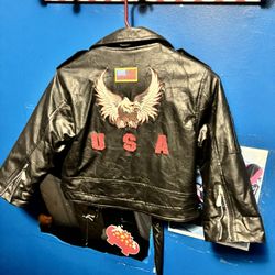 $45 (very firm on price) Beautiful brand new child size (6T) biker style jacket. (it actually fit a Child age 8 when we first went to the store to pur