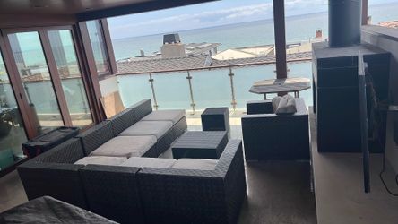 There are ten chairs outside.