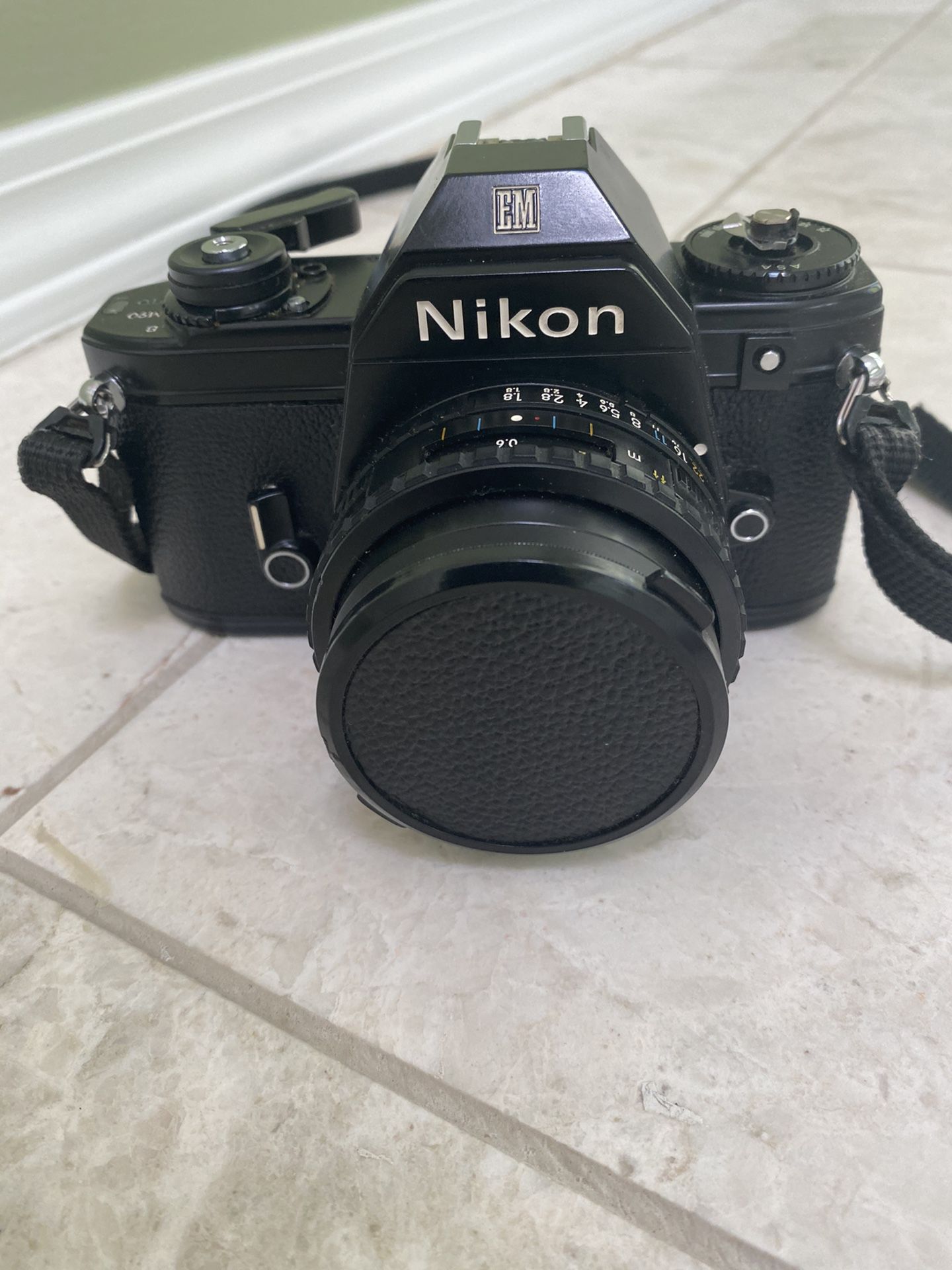 Nikon EM 35mm film camera with 50mm lens and Case