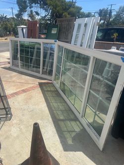 Windows set of 2 double glass retro fit width 95.5 inches  Height 48 inches Vinyl Sliding Windows Cash only  Pick up only in sun valley