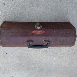 Red Craftsman toolbox with some tools