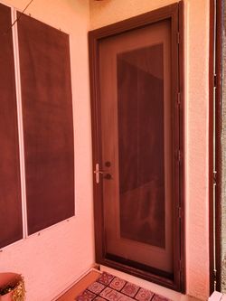 Heavy custom screen door with lock