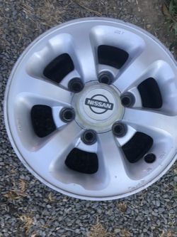 Set of four rims , ‘14 . ‘87 -‘97 Nissan