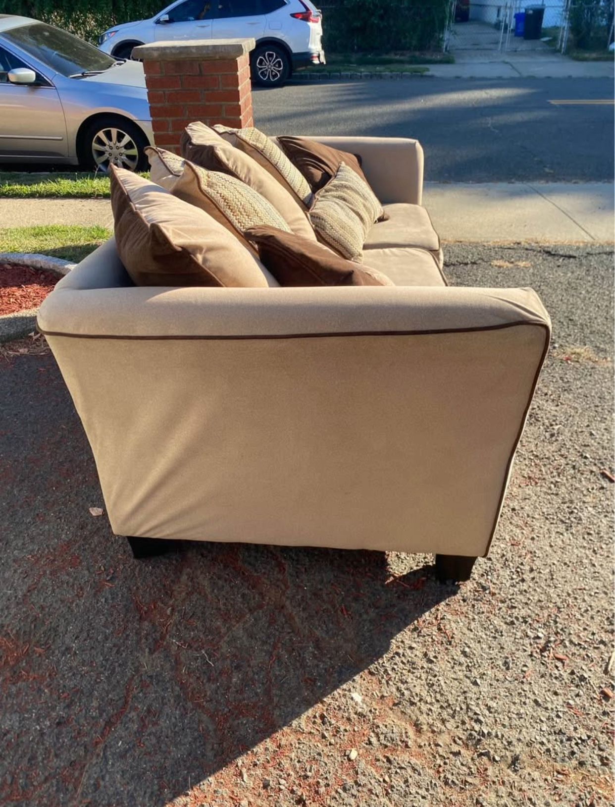 BEIGE PULL OUT SOFA .