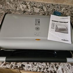 New George Foreman Grill, Books & 2 Drip Trays. No Box