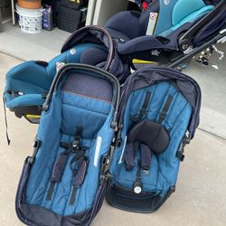 Twins - Double Stroller With Car Seats 