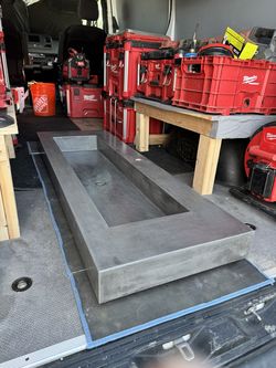 Custom concrete floating vanity sink