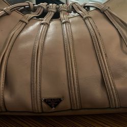 Prada purse with metal circle handles