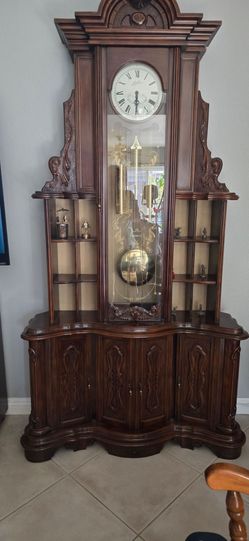 Grandfather clock with curio cabinet