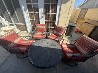 Great quality comfortable 4 rocking and spinning chairs with table