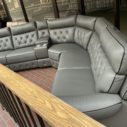 New gray leather power recliner sectional sofa floor model