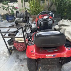 Tractor and pressure washer they both work