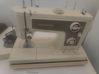 Kenmore sewing machine works perfectly in very good condition with the original case and all attachments