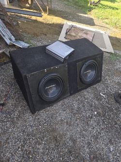 Two pioneer 10" subwoovers, comes with a five hundred watt amp
