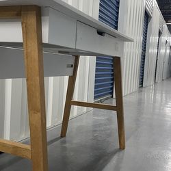 Nathan James Telos computer desk with a white finish and light wood legs