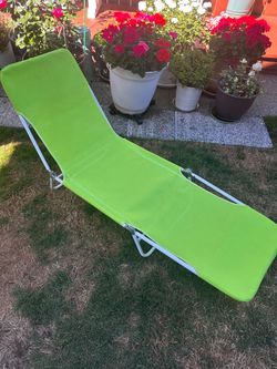 Folding beach chair lounge.