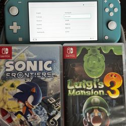Switch Lite With 2 Games,carrying Case And 32gb Of Extra Storage (PLEASE READ DESCRIPTION)