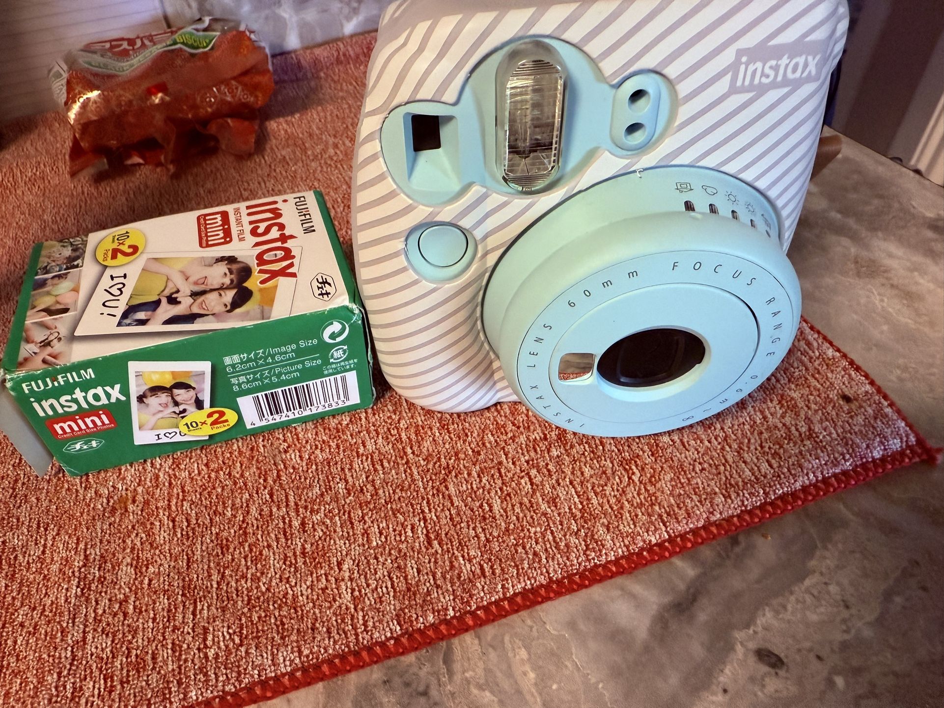 Fujifilm Cámara Instantánea Instax Mini 9 (Azul Hielo) con Paquete de Película Instax Mini