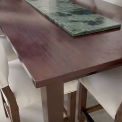 Wooden table with 6 chairs