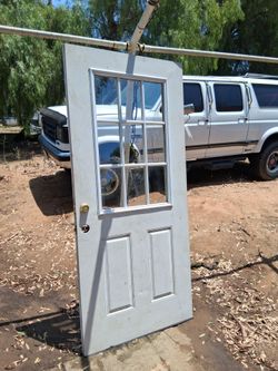 White Exterior Door with 9-Lite Glass Window
