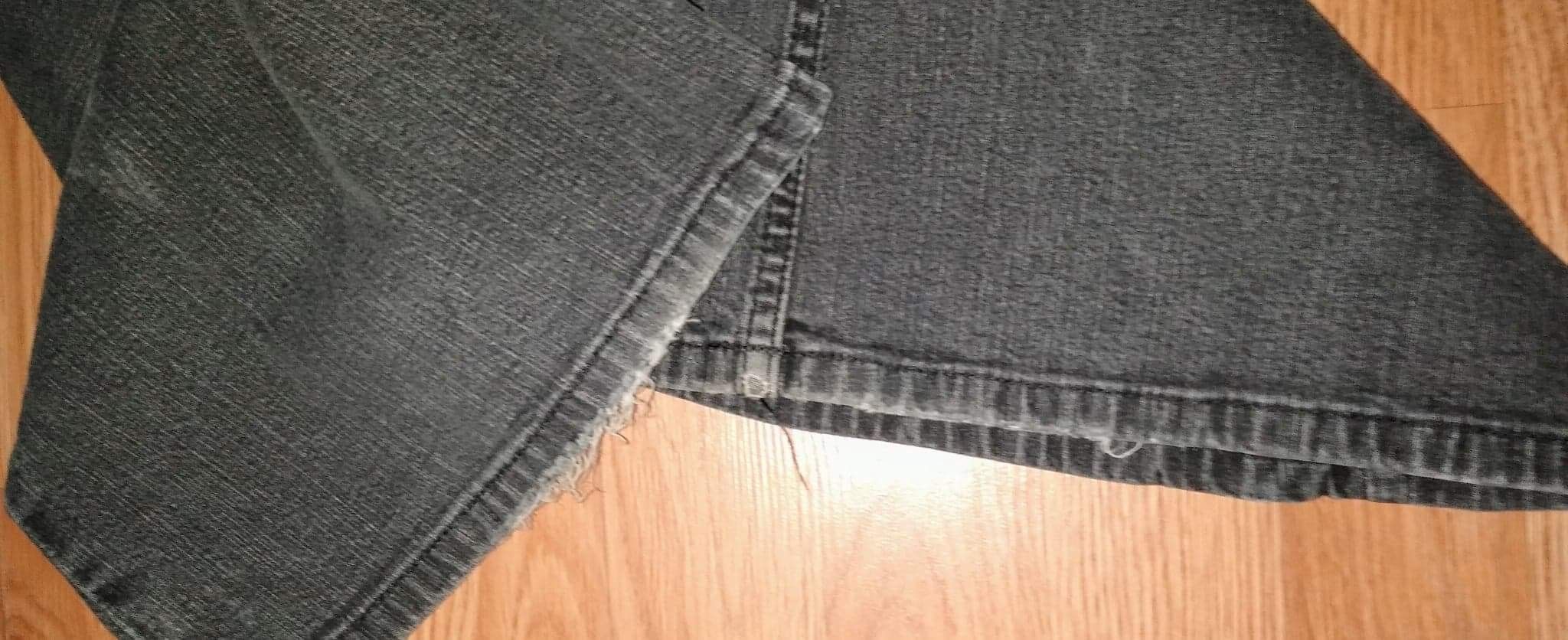 Faded black distressed boot cut jeans size 12R