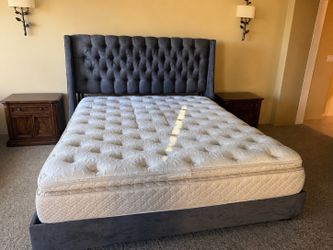 Cal king tufted bed frame. mattress not included.