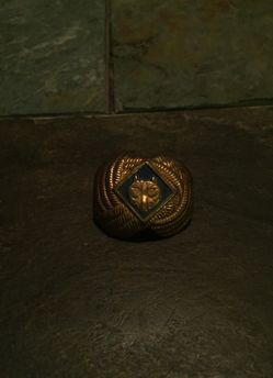 Used in cub scouts to go on their handkerchief around their neck