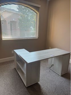 Modern L-Shaped Swivel Desk with Integrated Power & Storage