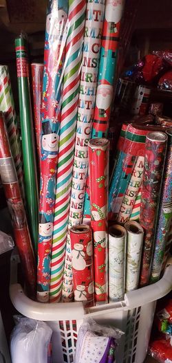 Christmas gift rapping paper various $1, $2 and packets of three $4