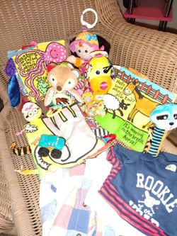 Lot of baby boy clothes toys and blankets