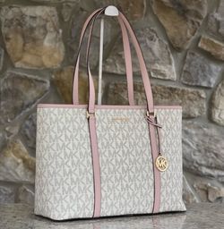 Pink and white michael kors large tote bag