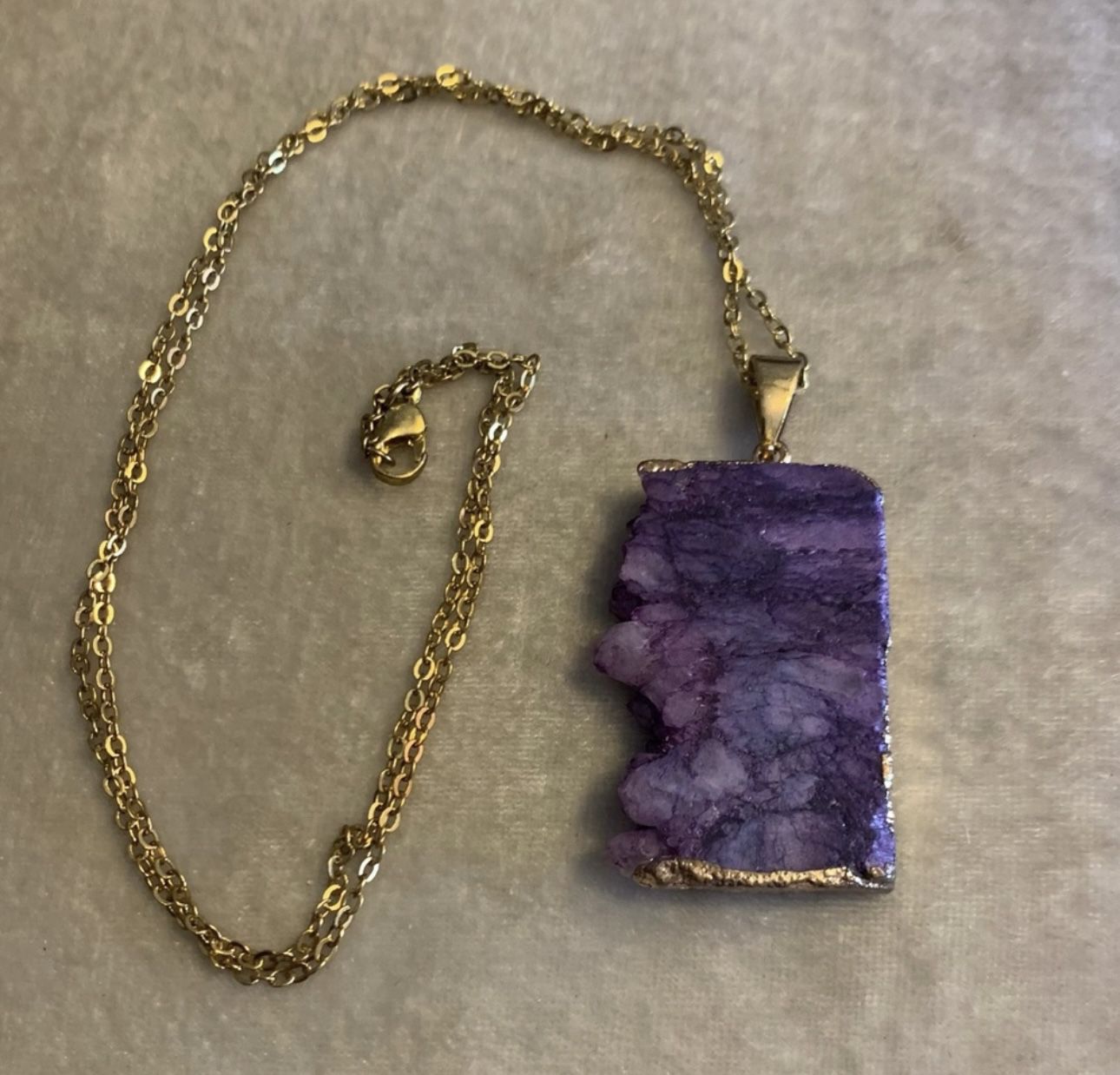 Purple Dyed Crystal Sliced Pendant With A Gold Plated Chain Necklace 