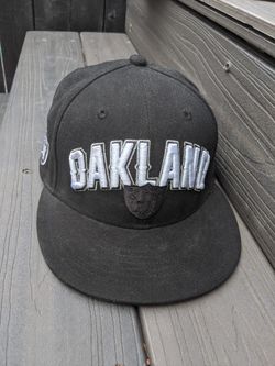 Black and silver NFL Oakland Raiders hat