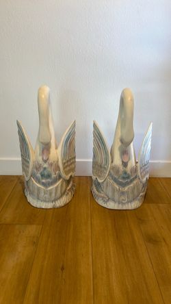 Two rate vintage hand carved wooden swans