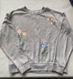 Girls  XL flower sweater $2