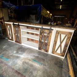 Custom sliding barn door tv stand. YES ITS AVAILABLE. PRICED BY SIZE. ALL WORK IS CUSTOM MADE from a LICENSED artisan woodshop. Allstarwoodwerx. We