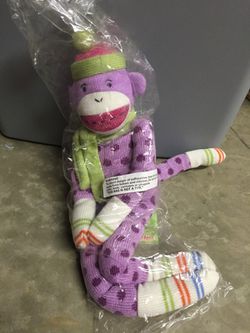 Brand new all purple sock monkey stuffed Animal