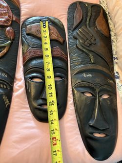 Durable cedar wood masks made in the Dominican Republic.