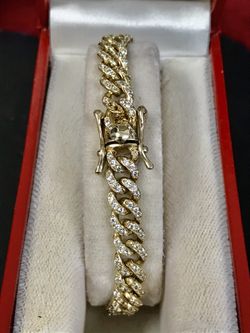 Cuban link CZ lady’s gold bracelet