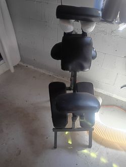 Sitting massage chair. Nice used Alot but in good condition . All extra items too.